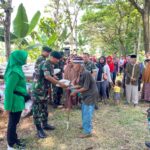 Yonif Raider 300/Bjw Melaksanakan Panen Raya Padi Bersama Warga Desa Binaan