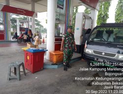 Meski Banyak Berita SPBU Babinsa Koramil 13 Kedungwaringin Tetap Laksanakan Pengamanan