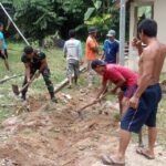 Satgas Pamtas RI-MLY Yonif 645/GTY Bersama Warga Perbatasan Karya Bhakti Pembuatan Jalan