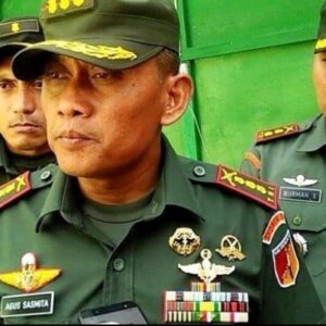 HUT ke-77 TNI Pusdiklatpassus Melaksanakan Kegiatan Sosial Bedah Rumah Warga