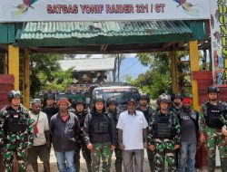 Memperingati HUT Ke-77 TNI, Satgas Yonif Raider 321/GT Kostrad Bagikan Sembako dan Nasi Kotak