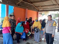 Di Kawal Ketat Babinsa Koramil 01 Tambun PT Pos Indonesia Salurkan BLT BBM Kepada Ratusan warga Desa Satria jaya
