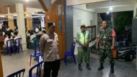 Babinsa Laksanakan Pengamanan Ibadah Malam Wafat Isa Almasih