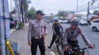 Patroli Polisi Bersepeda Beri Imbauan Antisipasi Kejahatan Pecah Kaca di Rest Area Pinang, Kota Tangerang