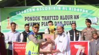 Suasana Haru Saat Kapolres Pelalawan Menggendong Anak Yatim Piatu di Salah Satu Panti Asuhan