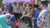 Jum’at Curhat Special Hari Bhayangkara Ke-77 Kapolres Sampang Bagikan Air Bersih Dan Sembako Di Desa Pacanggaan Pangarengan