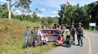 Satgas Yonif 132/BS Gelar Karya Bakti Bersama Masyarakat Kp. Kalibom