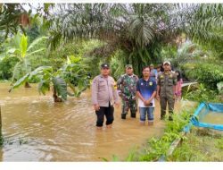 Polsek Parung Bersama Instansi Terkait Lakukan Pengecekan Adanya Luapan Aliran Air Kali Si Kabayan di Desa Babakan