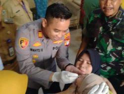 Kapolsek Teluknaga Hadiri Kegiatan Pekan Imunisasi di Desa Bojong Renged