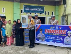 HUT Lalu Lintas Bhayangkara Ke 69, Satlantas Polres Pelalawan Bagikan 500 Paket Sembako