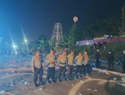Meski Diguyur Hujan, Pengamanan Penutupan HUT Kabupaten Pelalawan Ke-25 Berjalan Aman