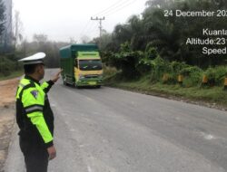 Satlantas Polres Kuansing Pantau Kamseltibcarlantas di Wilayah Perbatasan