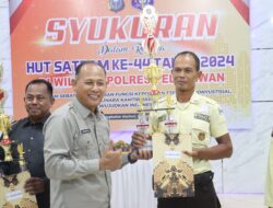 Peringati HUT Satpam ke 44, Polres Pelalawan Gelar Syukuran dan Pemotongan Tumpeng