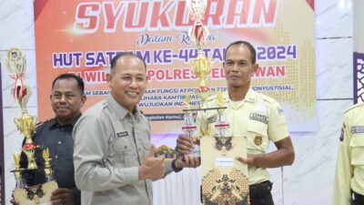 Peringati HUT Satpam ke 44, Polres Pelalawan Gelar Syukuran dan Pemotongan Tumpeng