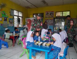 Dukung Gizi Anak dan Ibu Hamil, Babinsa Koramil 11 Pebayuran Kawal Distribusi Makanan Sehat