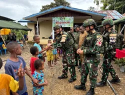 Satgas Yonif 126/KC Salurkan Bantuan dan Layanan Kesehatan di Tembutka