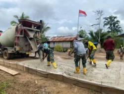 Satgas TMMD ke-126 dan Warga Kampung Babak Lanjutkan Pengecoran Jalan di Tambrauw
