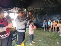 Sentuhan Kepedulian: Polres Humbahas Berikan Trauma Healing bagi Anak Korban Bencana