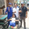 Ditpolairud Polda Metro Jaya Salurkan Bantuan Kursi Roda kepada Warga Pesisir di Muara Angke