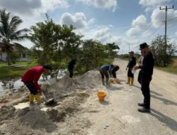 Sinergitas Polri dan Masyarakat Bahu Membahu Bangun “Jembatan Merah Putih Presisi” di Sungai Mandau