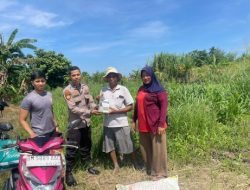 Dukung Ketahanan Pangan, Polsek Kawasan Pelabuhan Polresta Pekanbaru Salurkan Bantuan Pupuk dan Racun 