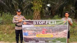Polres Kuansing Pasang Poster dan Maklumat Larangan PETI, Warga Diajak Jaga Lingkungan