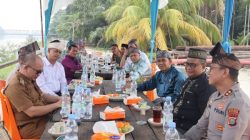 Tiba di Langgam, Kapolres Pelalawan AKBP Ahmad Nur Ari Disambut Pemasangan Tanjak